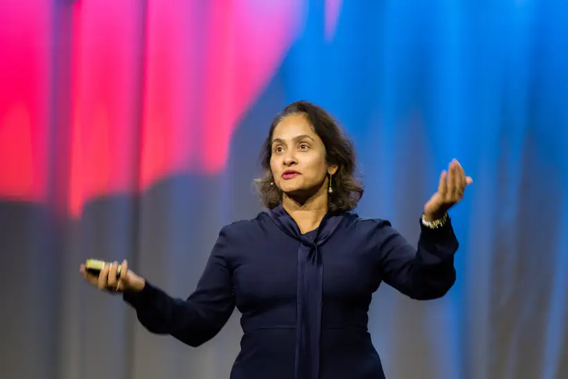 Speaker gesturing intensely.