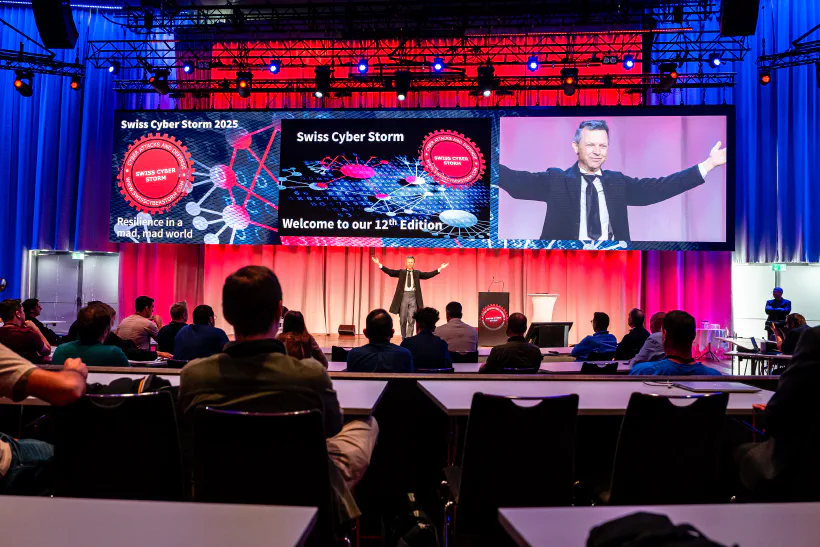 View of the main stage of the Swiss Cyber Storm conference with a lineup of speakers